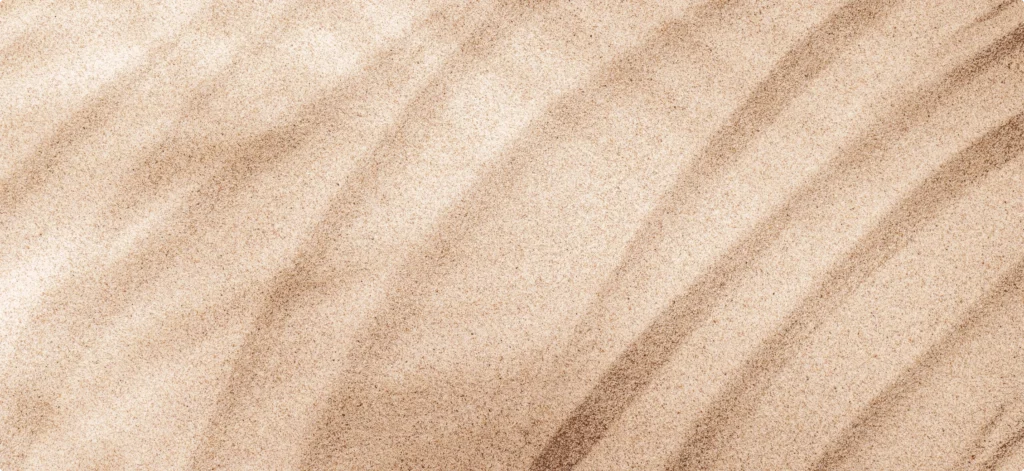Sand med vågmönster